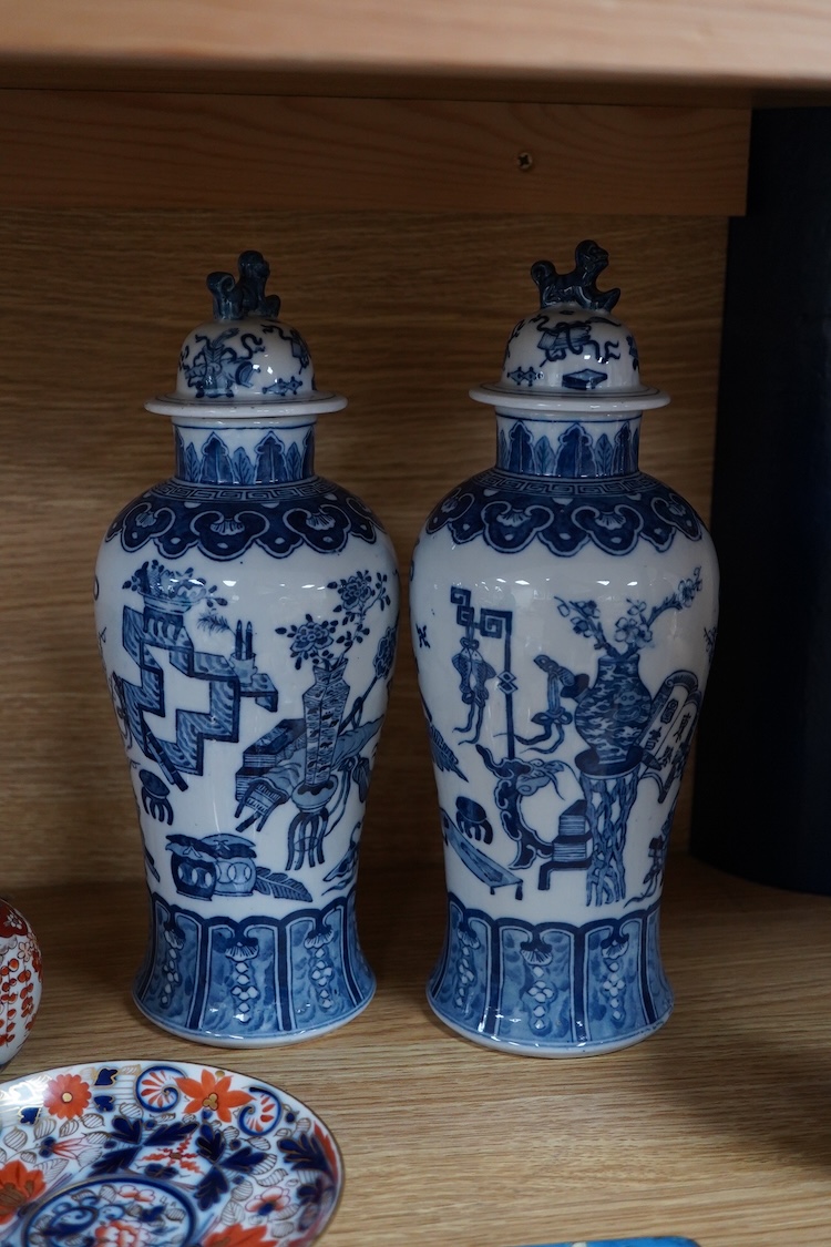 A pair of Chinese blue and white vases and covers and three other items, together with Japanese ceramics, cloisonné and Canton enamelware (11)